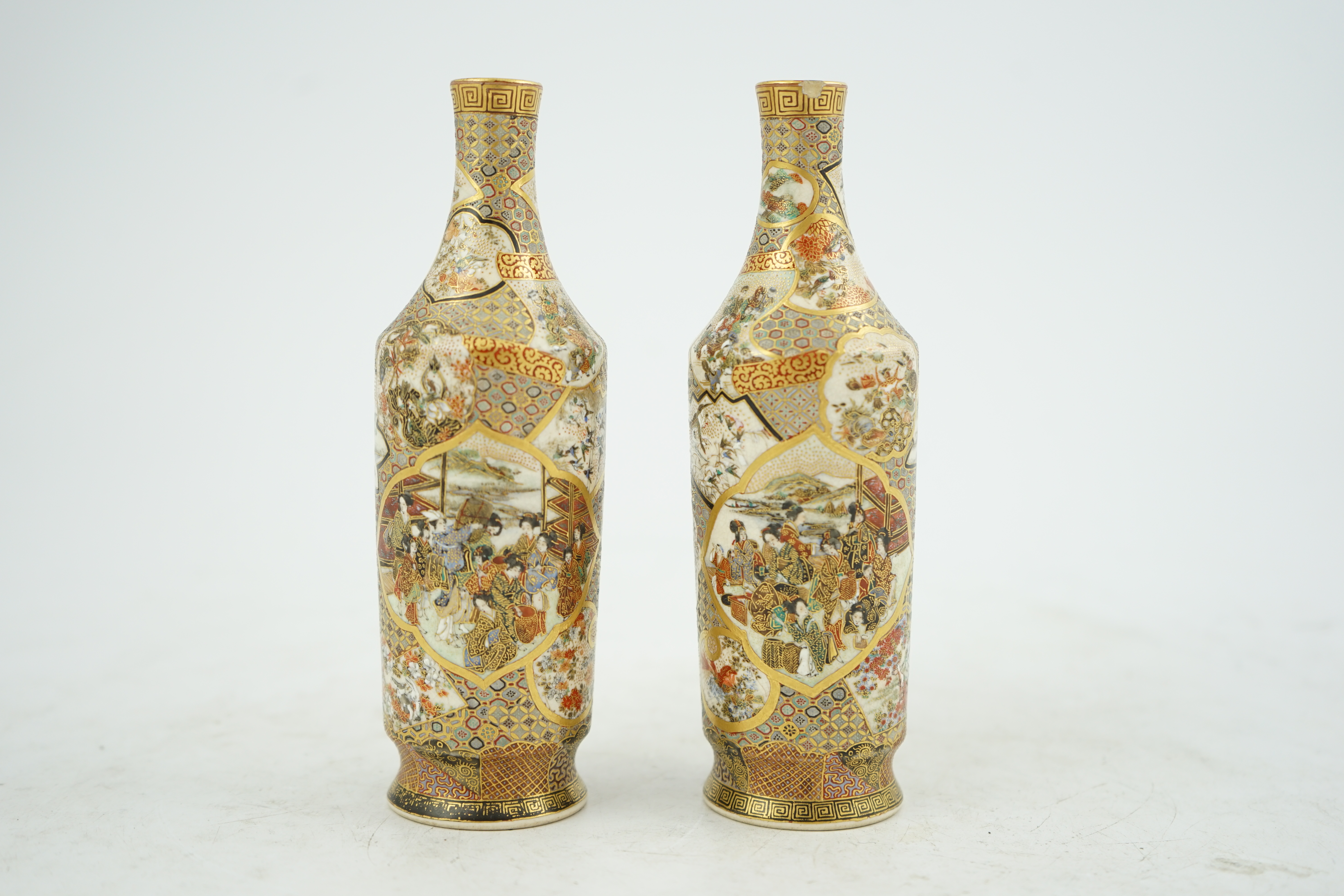 A pair of Japanese Satsuma bottle vases, Meiji period